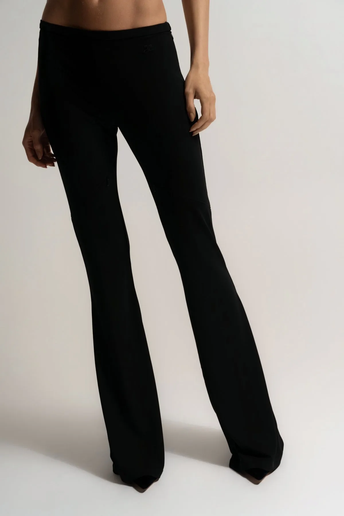 COURRÈGES | ELLIPSE ZIPPED CREPE JERSEY BOOTCUT PANTS